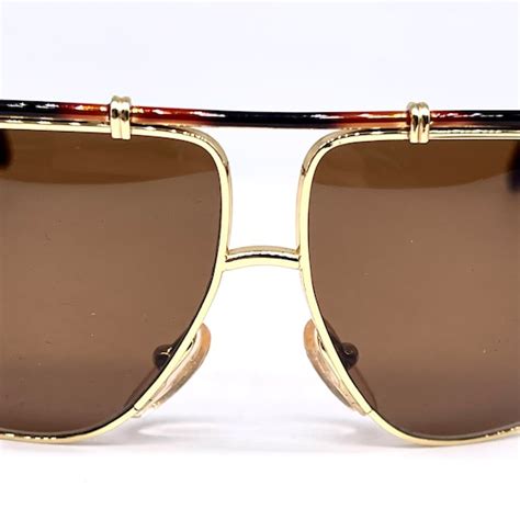 gianni versace mod s35|Gianni Versace Mod S35 avant garde wrap sunglasses in golden .